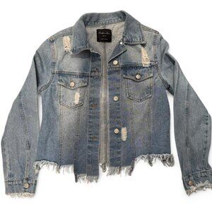 Distressed denim jacket with frayed hem and cuffs